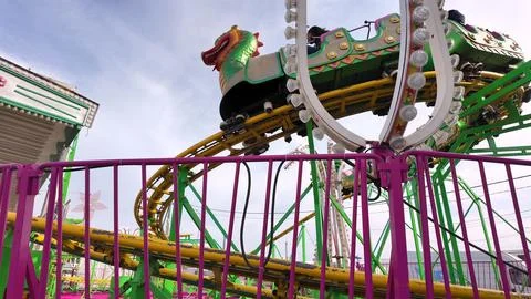 A dragon-themed roller coaster at the Feira de Maro in Aveiro Stock Photos
