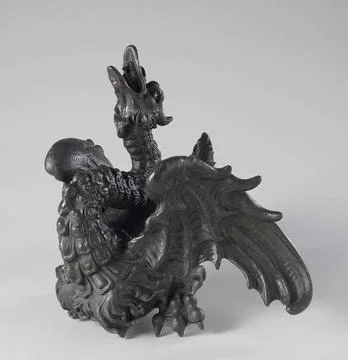 . Dragon, which simplified with a thrown head and scalyed neck rests on it... Stock Photos