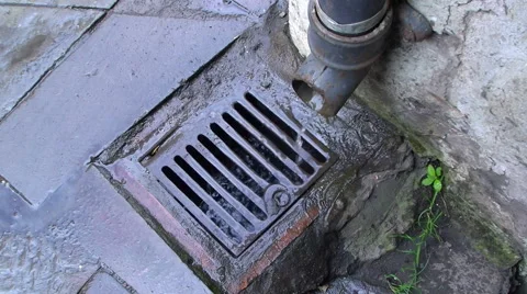 Drain and pipe looped looking down Stock Footage 57140837
