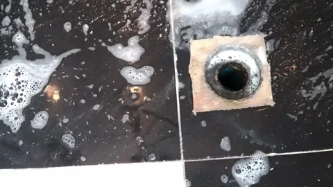 Drain cleaning,Test the bathroom drain clogged with hair in the bathroom. Stock Footage 312305238