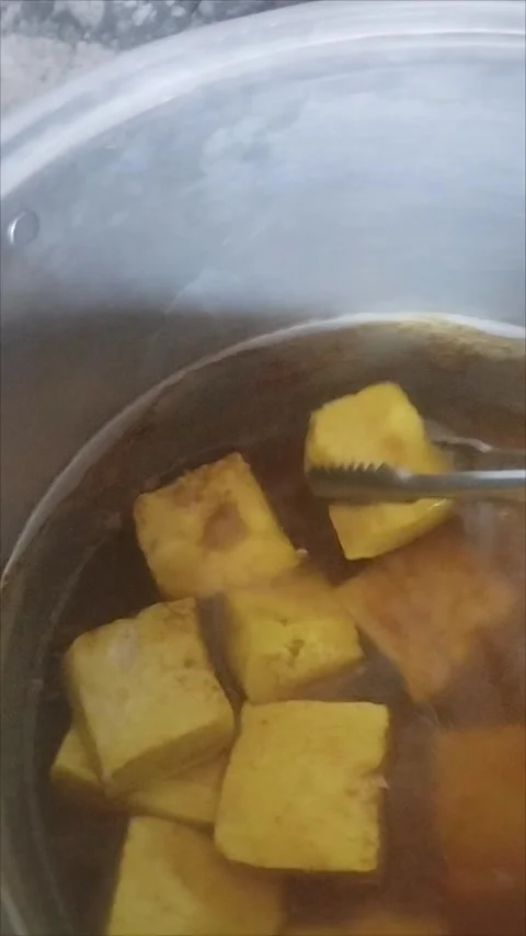 Drain the cooked tofu Stock Footage 291210219