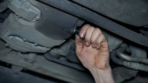 Drain engine oil from engine Stock Footage 264071501