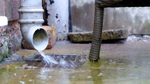 Drain overflowing with water Stock Footage 135993213