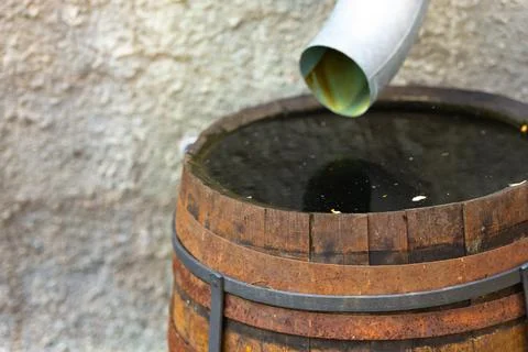 Drain pipe in a barrel Stock Photos