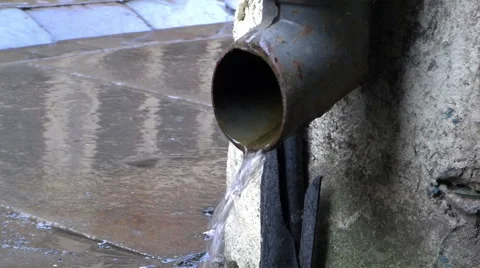 Drain pipe closeup Looped rain running Stock Footage 57141401