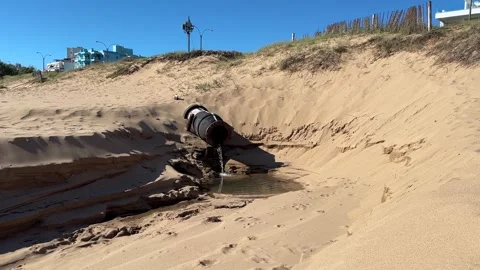 Drain pipe into the ocean 1 Stock Footage 255503510