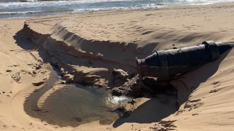 Drain pipe into the ocean 4 Stock Footage 255503513