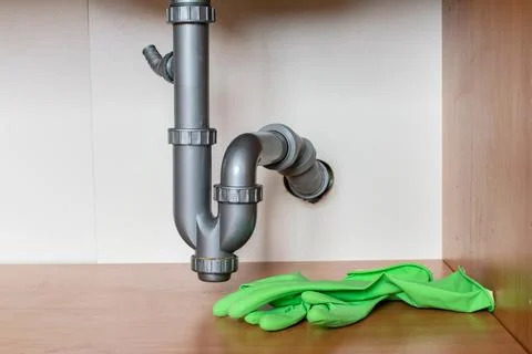 Drain Problems, blockage plumbing kitchen sink pipe unclog Stock Photos