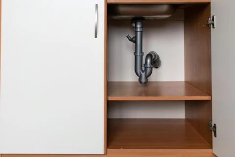 Drain Problems, blockage plumbing kitchen sink pipe unclog Stock Photos