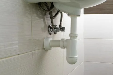 Drain Problems, symptoms Solutions blockage plumbing bathroom sink unclog Stock Photos