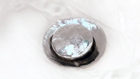 Drain with running water Stock Footage 88951774