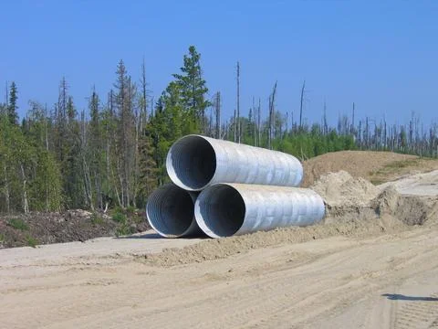 Drainage iron corrugated pipe in stack Stock Photos