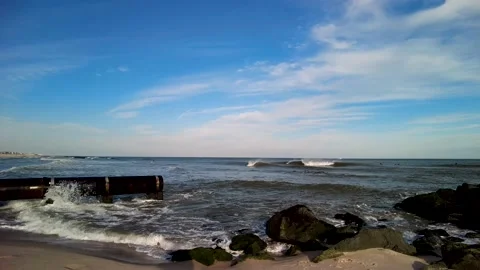 Drainage pipe on the beach in Spring Lake, NJ Stock Footage 145023966