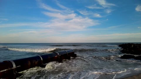 Drainage pipe on the beach in Spring Lake, NJ 스톡 동영상 145023992