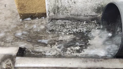 Drainage pipe from the gutter on the 2nd floor Stock Footage 255001288