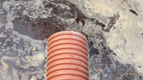 Drainage pipe with water stream flowing. Plastic pipes for the sewage Video stock 240556724
