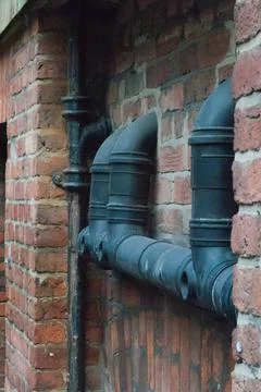 Drainage on side of building Stock Photos