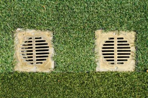 Drainage system in artificial grass floor, top view Stock Photos