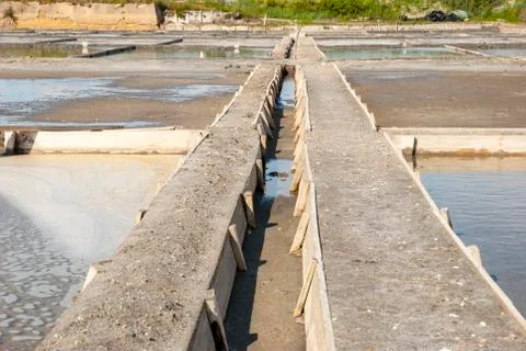 Drainage system between salt evaporation ponds Stock Photos