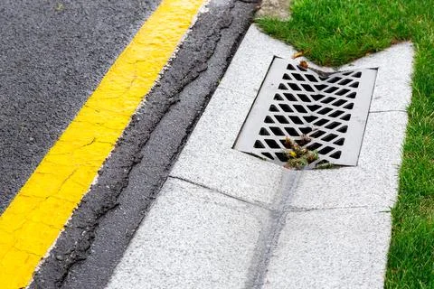 Drainage system edge tray with concrete grate for rainwater drainage. Stock Photos