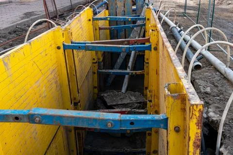 Drainage works on the construction site. Pumping groundwater from dug trenc.. Stock Photos