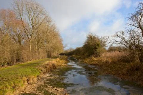 Drained canal in winter Stock Photos