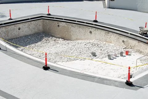 A drained pool under construction at a resort Stock Photos
