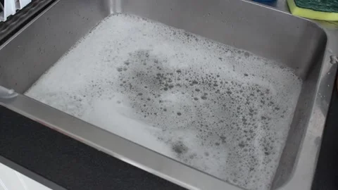 Draining A Sink After Dishwashing Stock Footage 237966611