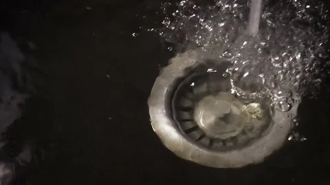 Draining the water in the sink Stock Footage 78419515
