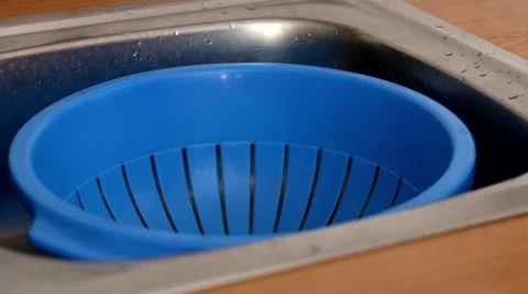 Draining the water while preparing Pasta Stock Footage 49653290