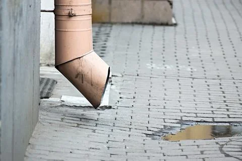 Drainpipe and pool Stock Photos