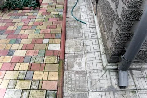 Drainpipe and tiled floor Фото