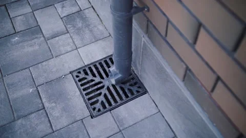 Drainpipe on the background of the brick house Stock Footage 134385019