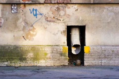 Drainpipe in the wall Stock Photos