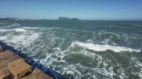 Dramatic 180-degree panoramic sweep right to left capturing crashing ocean waves Stock Footage 326243269