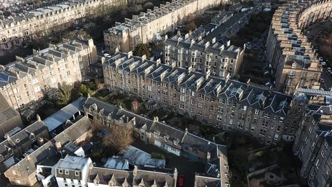 Dramatic 4k Aerial / Drone Shot Revealing the city of Edinburgh Scotland Stock Footage
