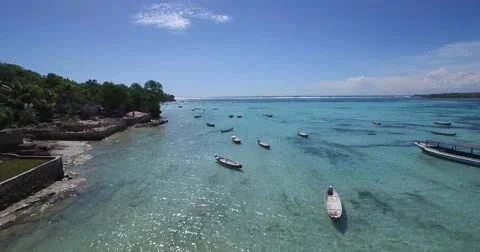 DRAMATIC 4K AERIAL SEQUENCE OF LOCAL FISHING BOATS FLOATING IN CANNAL Stock Footage 60001917