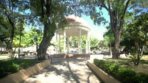 Dramatic 4k of downtown central park in Bani Dominican republic. Stock Footage 140136756