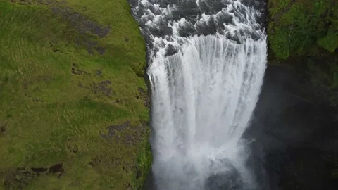 Dramatic 4K drone view of Skogafoss waterfall, Iceland Stock Footage 163341542