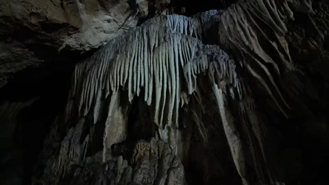 Dramatic 4K Limestone Cave Drone Aerial View in Dong Nguom, Vietnam Stock Footage 347152487