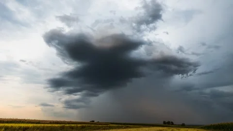 Dramatic 4K Timelapse of Approaching Thunderstorm with Dark Clouds and Rainfall Stock Footage 303965054