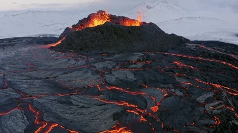 Dramatic 4K Volcano Erupting Lava Flow in Twilight Landscape Stock Footage 323837569