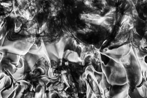 Dramatic Abstract plume of black smoke and white huge flame of strong fire Stock Photos