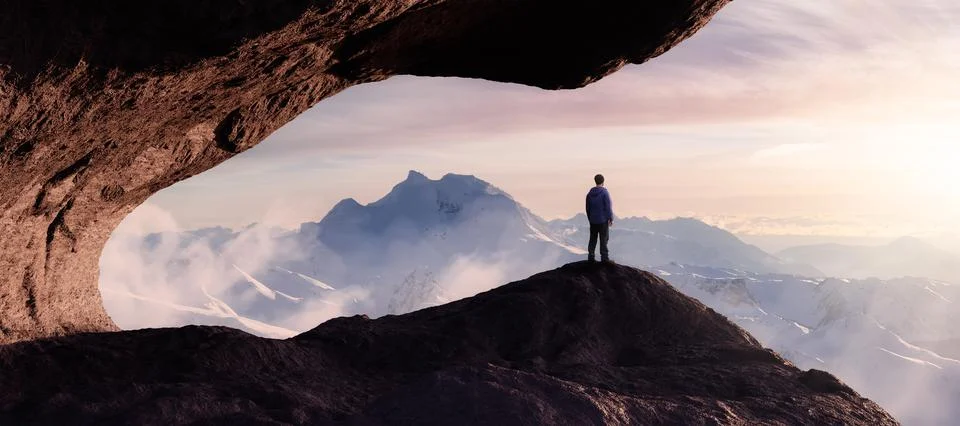 Dramatic Adventurous Scene with Man standing inside a Rocky Cave Stock Illustration