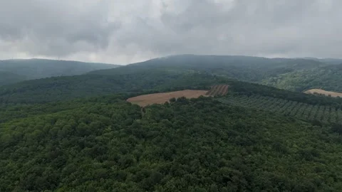 Dramatic aerial 4k drone timelapse footage showing clouds passing Stock Footage 341528492
