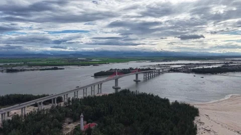 Dramatic aerial angle of Thuan An cable-stayed bridge 4K Stock Footage 339860714