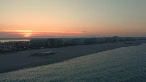 Dramatic aerial camera shot of sunset holiday resort Stock Footage 112715281