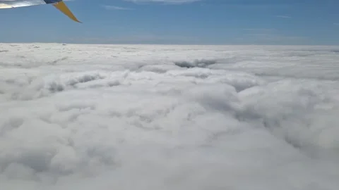 Dramatic Aerial Close-Up of Clouds Taken From a Plane During Takeoff Stock Footage 305289342