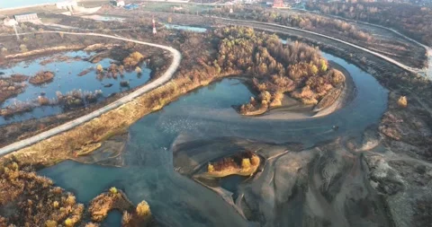 Dramatic aerial drone footage of a river. Sunrise drone footage. Stock Footage 198356049