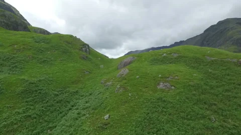 Dramatic aerial / drone shot revealing Glencoe in the Scottish highlands Stock Footage